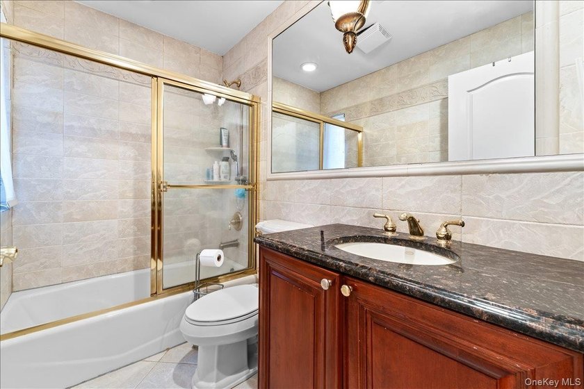 This young Center Hall Brick Colonial offers a spacious and - photo 25