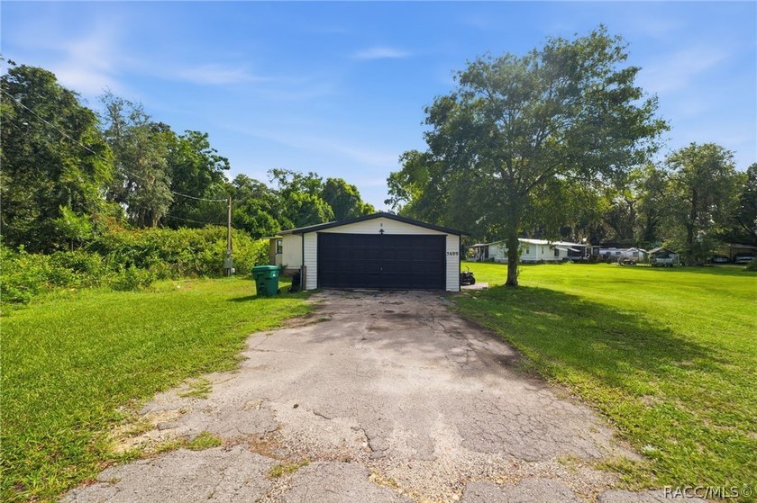 Located on a 0.19-acre corner lot in Floral City, this - photo 7