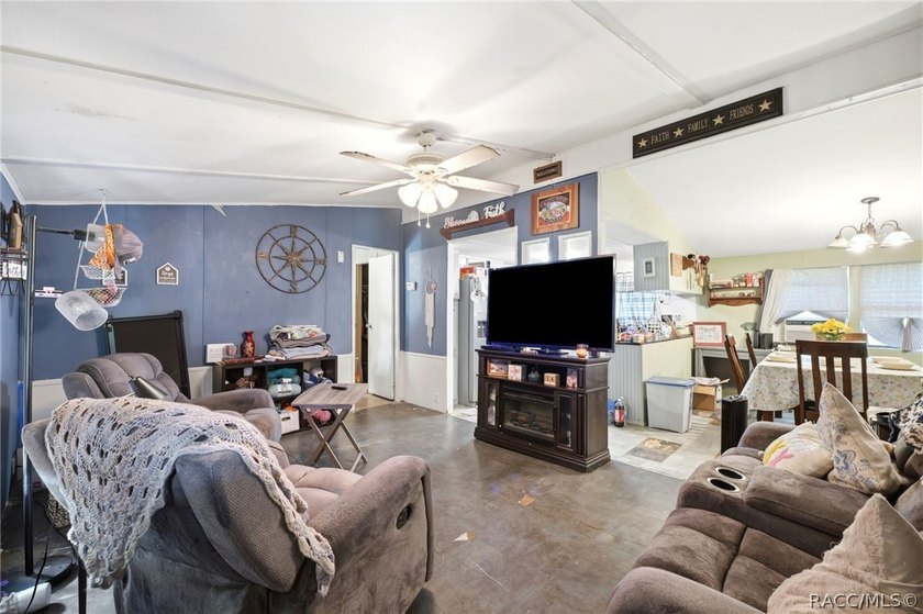 Located on a 0.19-acre corner lot in Floral City, this - photo 8