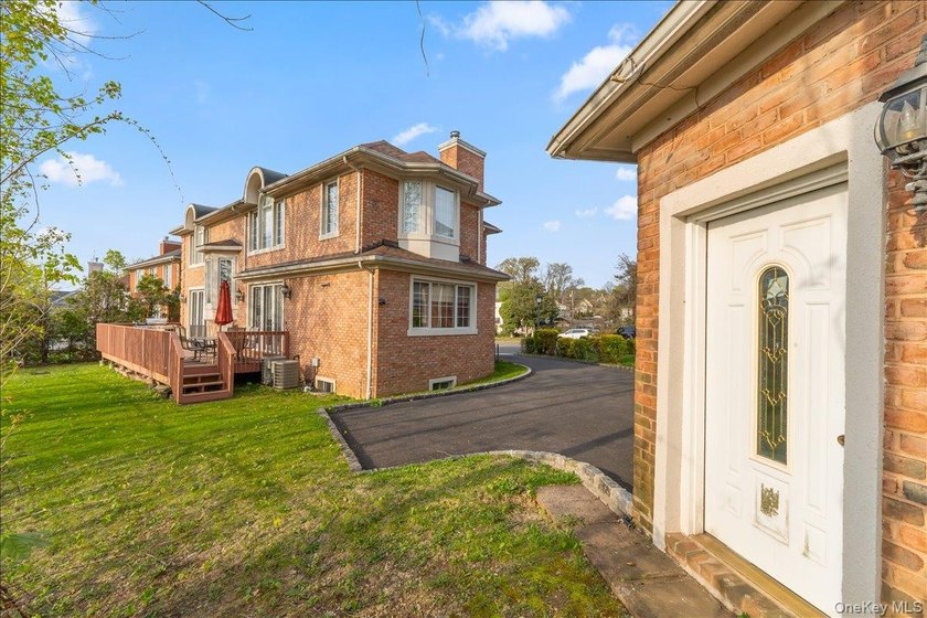 This young Center Hall Brick Colonial offers a spacious and - photo 37