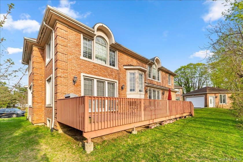 This young Center Hall Brick Colonial offers a spacious and - photo 38