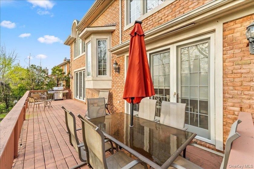 This young Center Hall Brick Colonial offers a spacious and - photo 39
