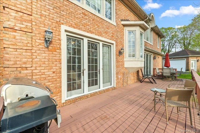 This young Center Hall Brick Colonial offers a spacious and - photo 40