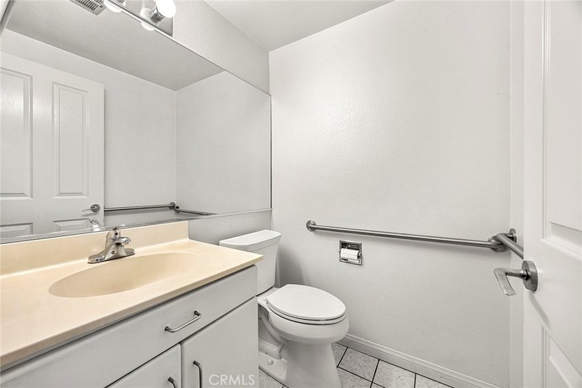 A value packed multi-generational residence awaits, set within a - photo 18