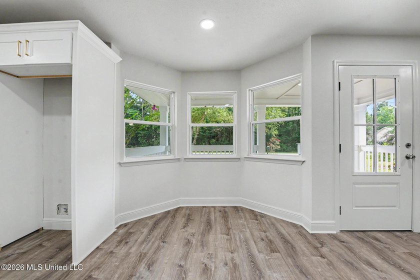 What a beautifully remodeled home on two lots with a metal - photo 12