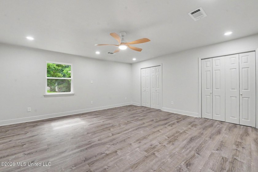 What a beautifully remodeled home on two lots with a metal - photo 13