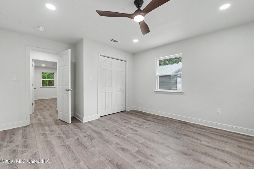 What a beautifully remodeled home on two lots with a metal - photo 19