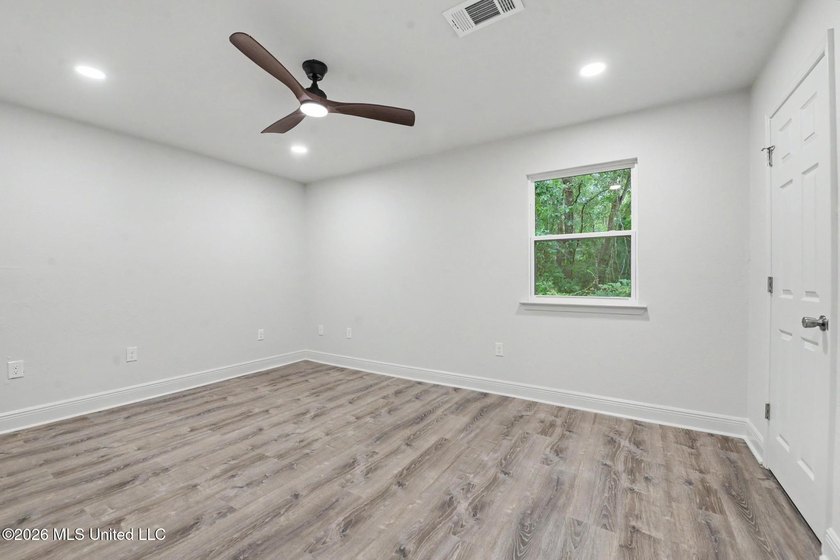 What a beautifully remodeled home on two lots with a metal - photo 23