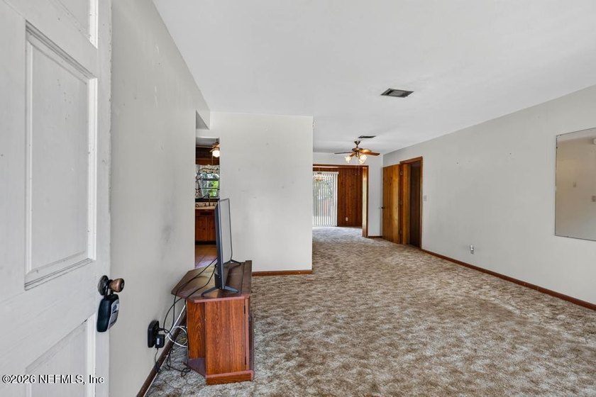 This 3-bedroom, 2-bath home offers a wonderful opportunity to - photo 3