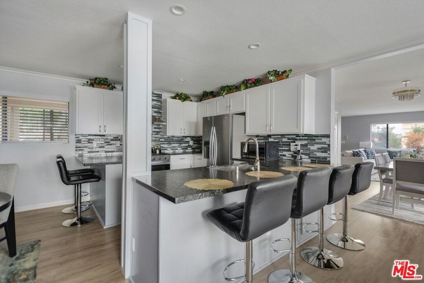 Refined, upgraded, and exceptionally cared for, this expansive - photo 24
