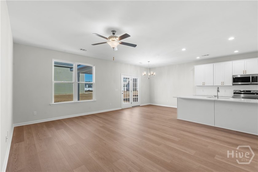 The Hatteras floorplan by Smith Family Homes is under - photo 4