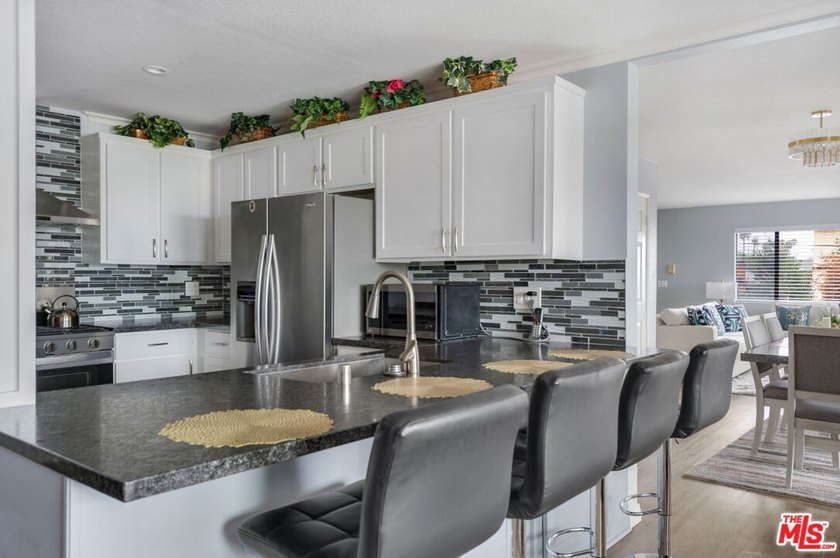 Refined, upgraded, and exceptionally cared for, this expansive - photo 25