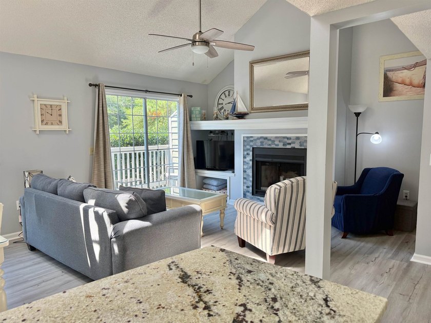 Updated townhome with new grey weathered-looking LVP flooring - photo 16