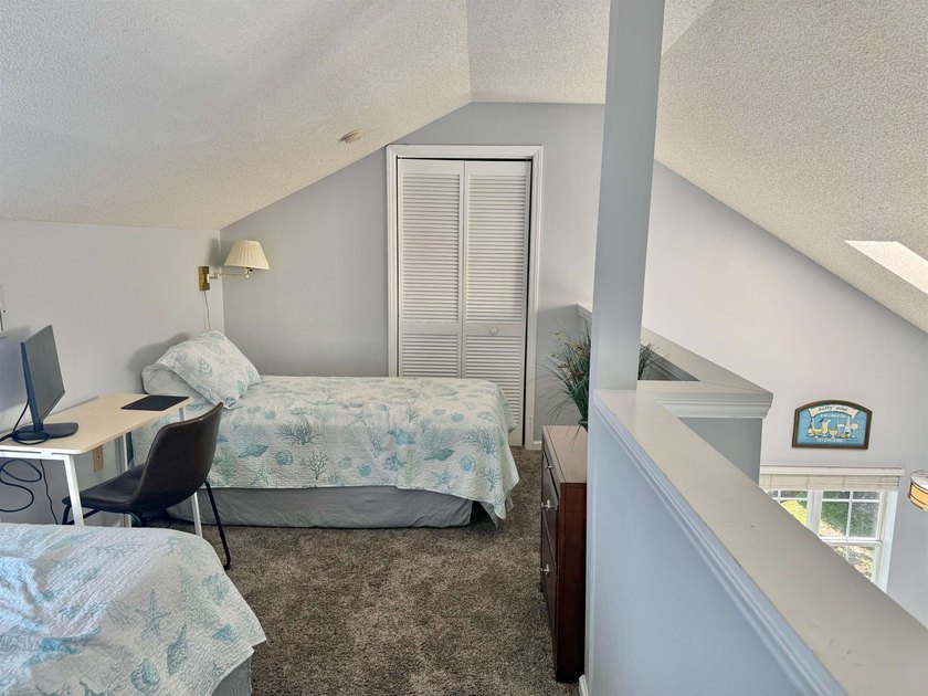 Updated townhome with new grey weathered-looking LVP flooring - photo 18