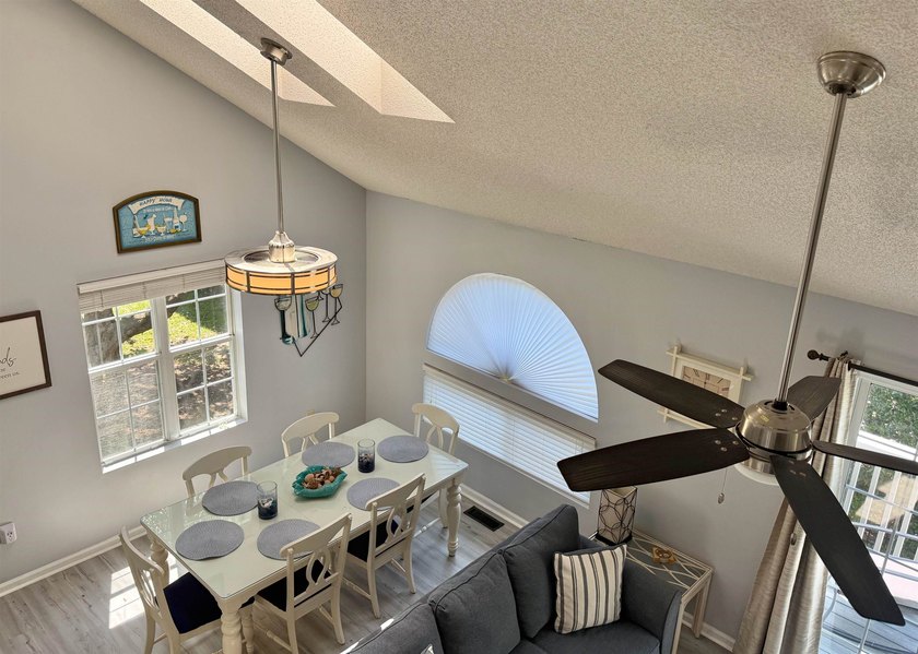 Updated townhome with new grey weathered-looking LVP flooring - photo 21