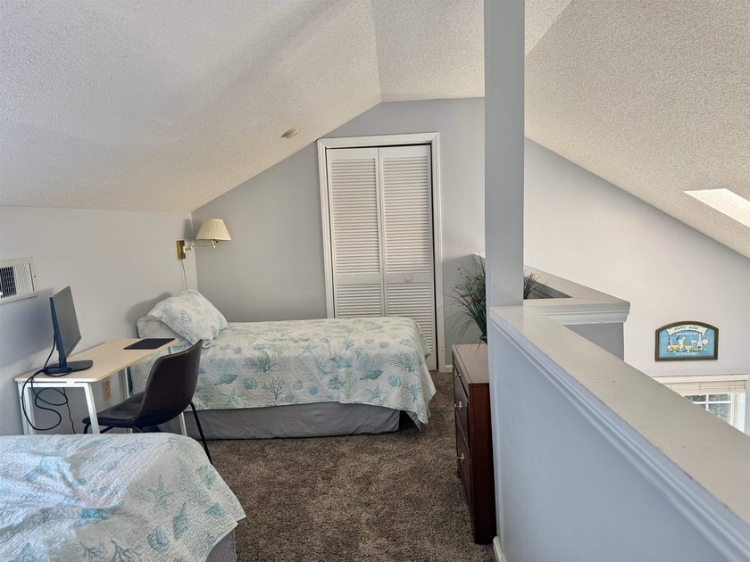 Updated townhome with new grey weathered-looking LVP flooring - photo 24