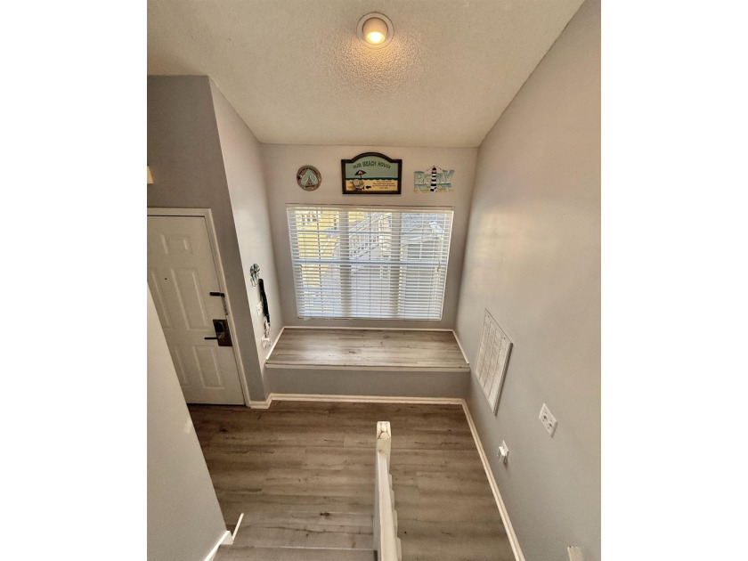 Updated townhome with new grey weathered-looking LVP flooring - photo 25