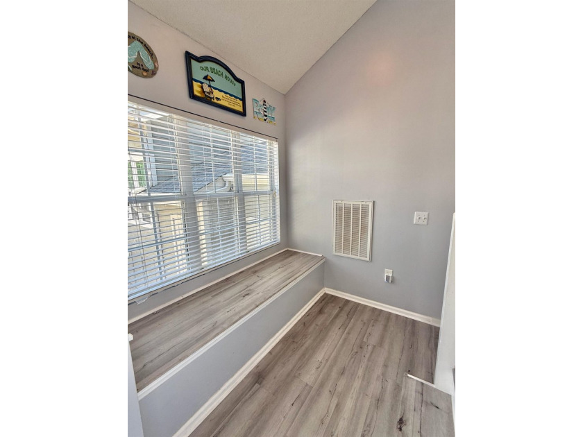 Updated townhome with new grey weathered-looking LVP flooring - photo 27