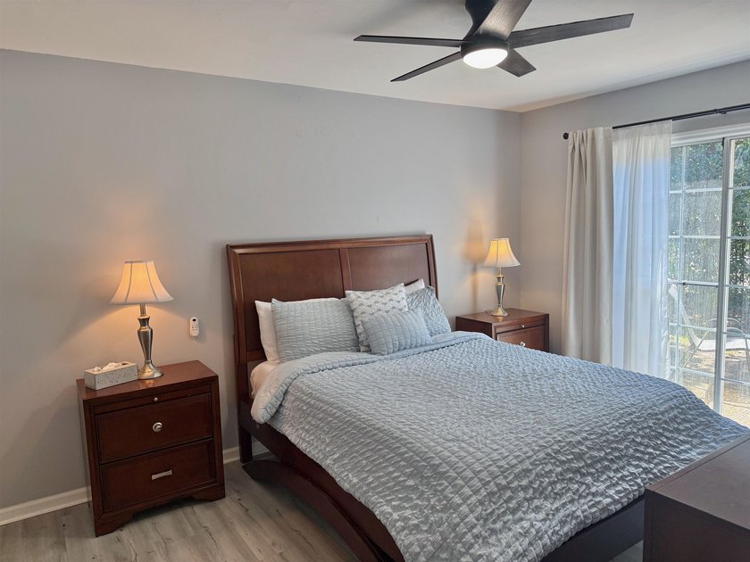 Updated townhome with new grey weathered-looking LVP flooring - photo 31