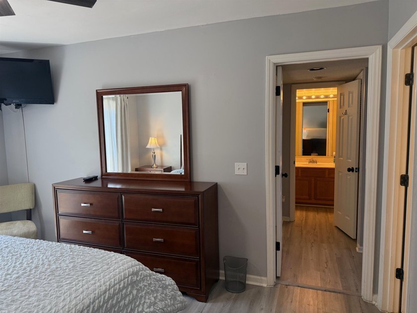 Updated townhome with new grey weathered-looking LVP flooring - photo 33