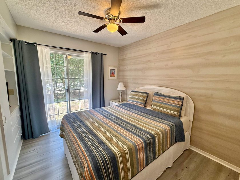 Updated townhome with new grey weathered-looking LVP flooring - photo 37