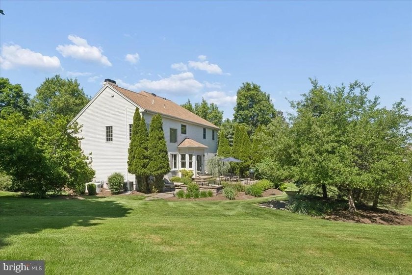 Positioned on a generous corner lot at the entrance to a quiet - photo 40
