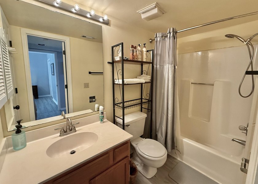 Updated townhome with new grey weathered-looking LVP flooring - photo 41