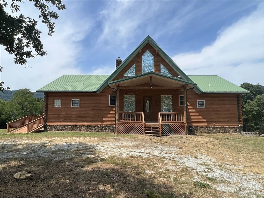 Beautiful views with this secluded log home on 207 acres m/l - photo 3