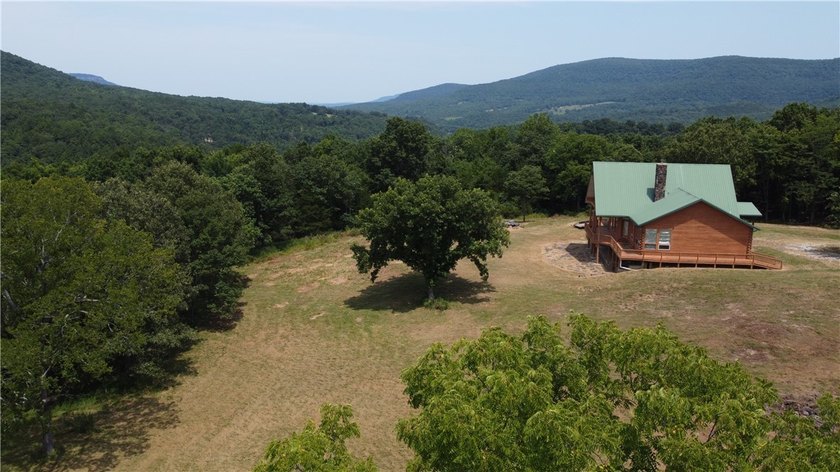 Beautiful views with this secluded log home on 207 acres m/l - photo 4