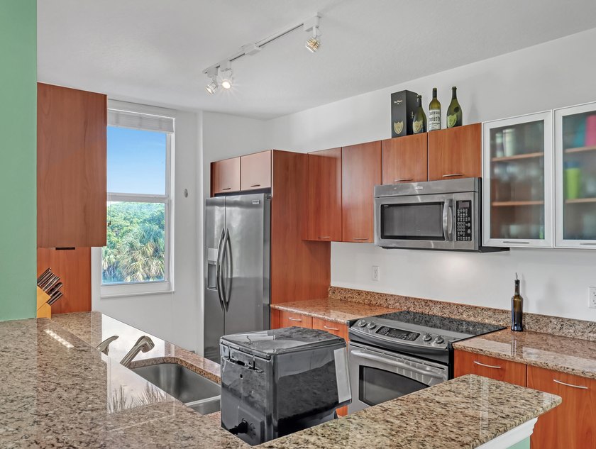 Lots of great perks come with this Marina Village corner unit - photo 16