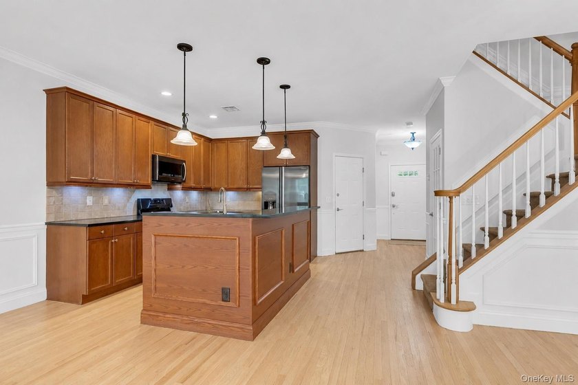 Tucked within the heart of vibrant Patchogue Village, this - photo 12
