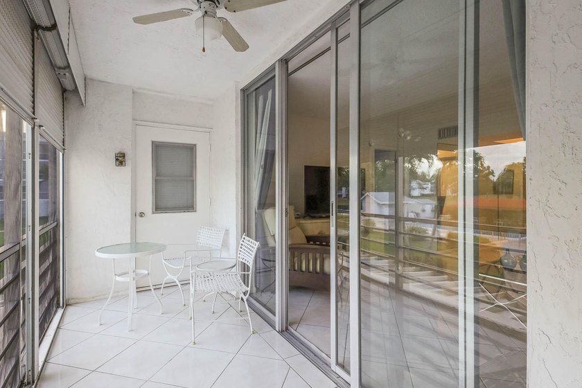 WELCOME TO THIS NATURALLY BRIGHT CONDO WITH SOUTH FACING BALCONY - photo 12