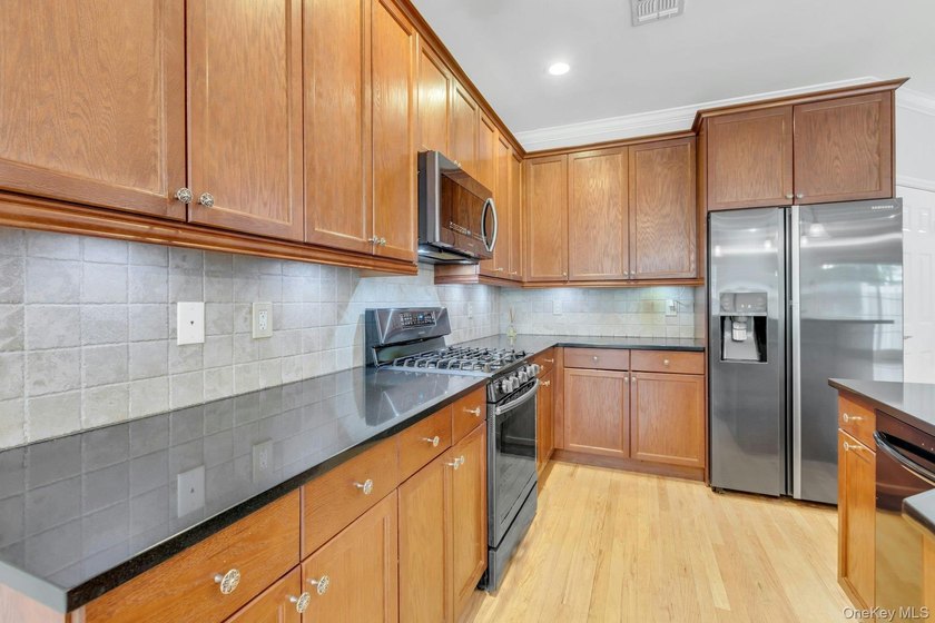 Tucked within the heart of vibrant Patchogue Village, this - photo 13