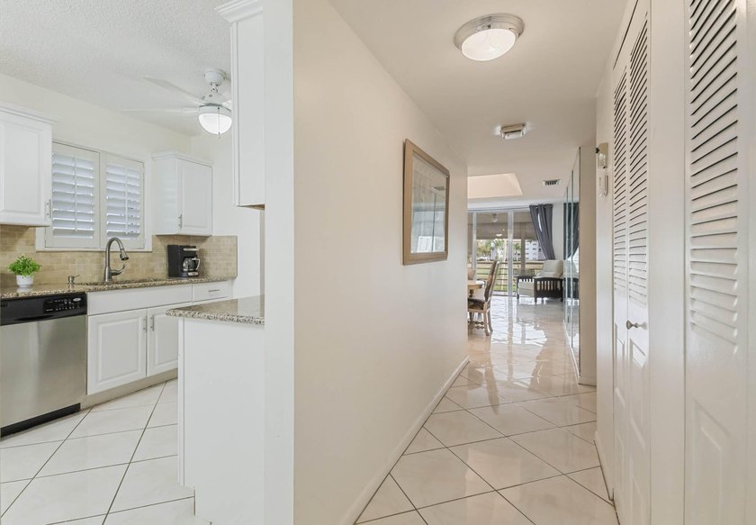 WELCOME TO THIS NATURALLY BRIGHT CONDO WITH SOUTH FACING BALCONY - photo 13