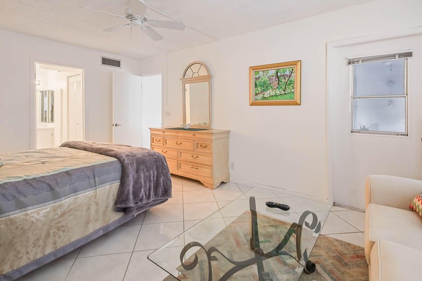 WELCOME TO THIS NATURALLY BRIGHT CONDO WITH SOUTH FACING BALCONY - photo 16