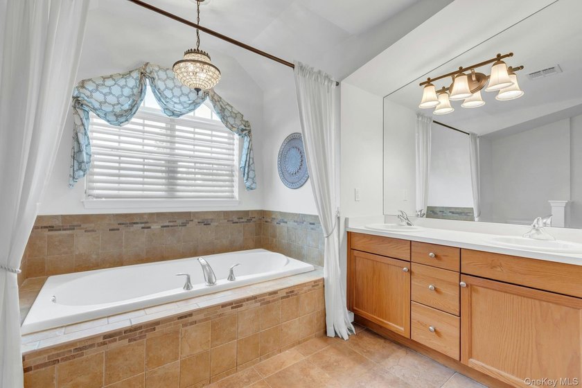 Tucked within the heart of vibrant Patchogue Village, this - photo 22