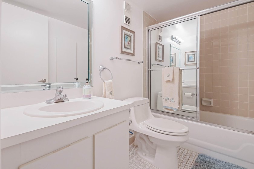 WELCOME TO THIS NATURALLY BRIGHT CONDO WITH SOUTH FACING BALCONY - photo 23