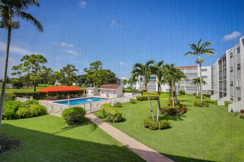 WELCOME TO THIS NATURALLY BRIGHT CONDO WITH SOUTH FACING BALCONY - photo 25