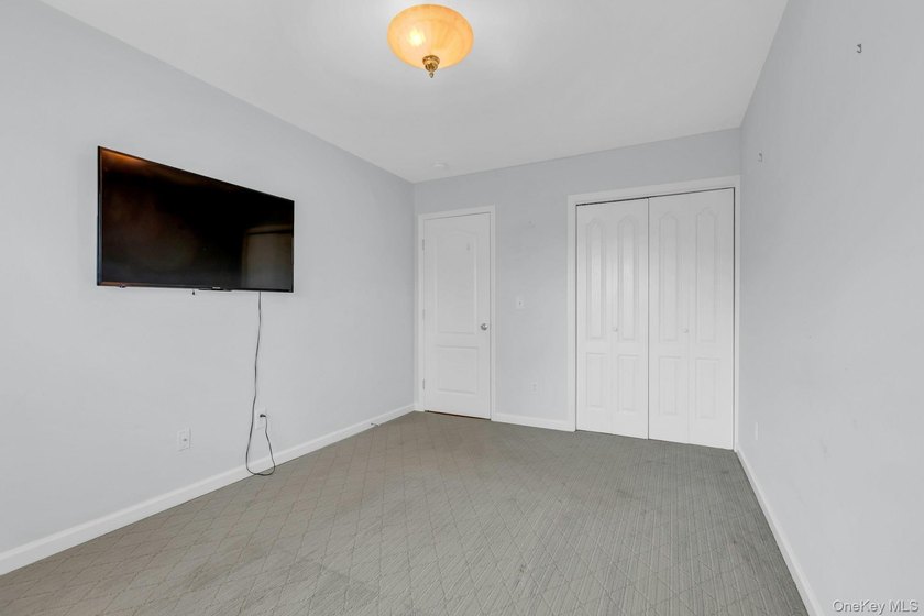 Tucked within the heart of vibrant Patchogue Village, this - photo 27
