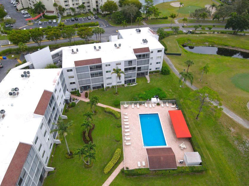 WELCOME TO THIS NATURALLY BRIGHT CONDO WITH SOUTH FACING BALCONY - photo 27