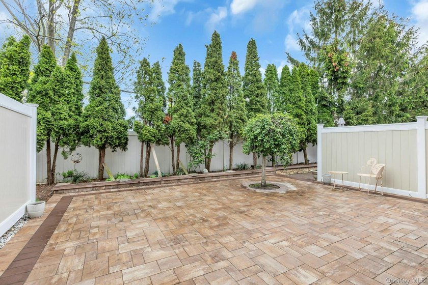 Tucked within the heart of vibrant Patchogue Village, this - photo 32