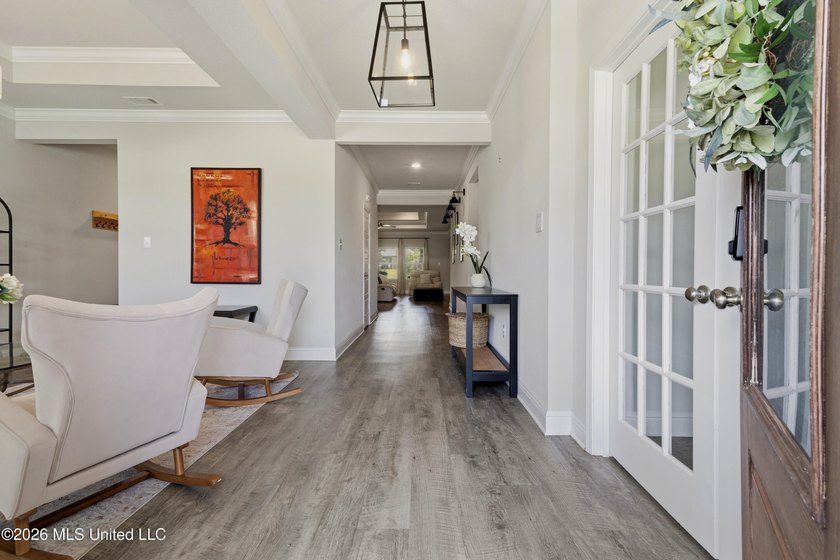 Step into this stunning 5-bedroom, 3-bathroom home offering the - photo 8