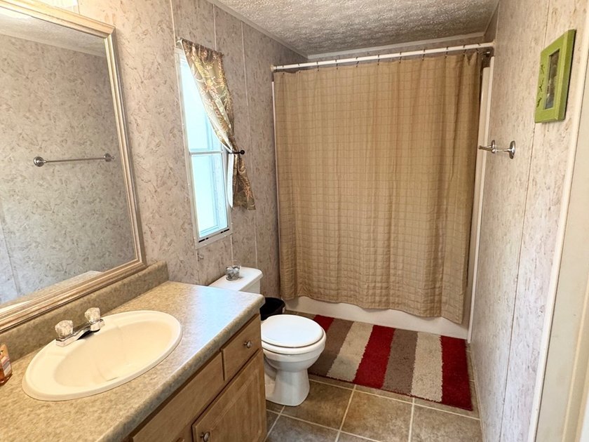 Set on nearly 100 acres of beautiful Golden Pond with easy - photo 6