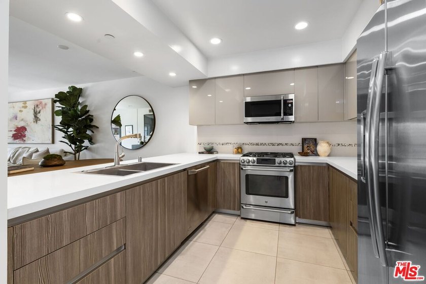 Stunning newer contemporary condo right across the street from - photo 5