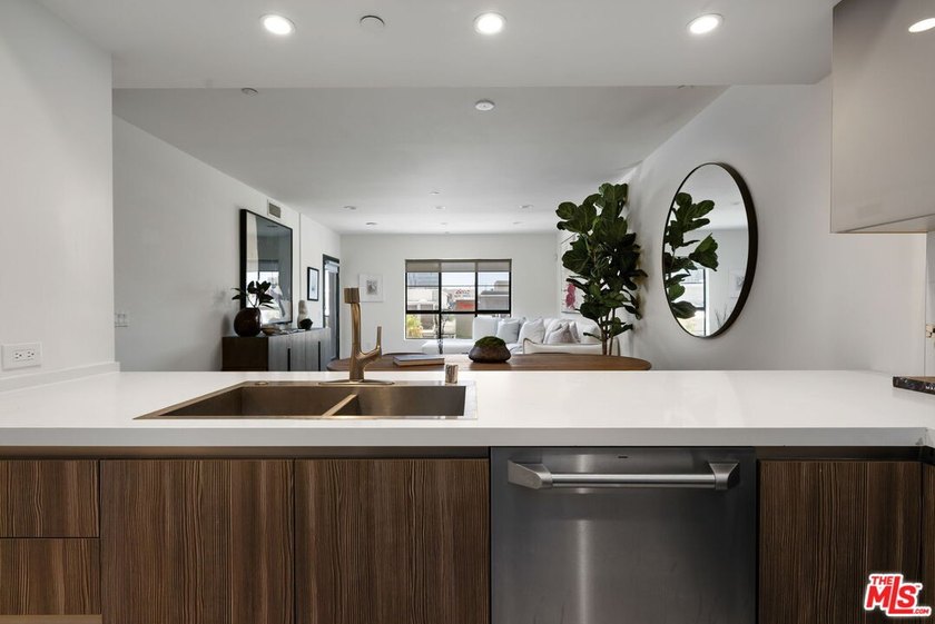 Stunning newer contemporary condo right across the street from - photo 7
