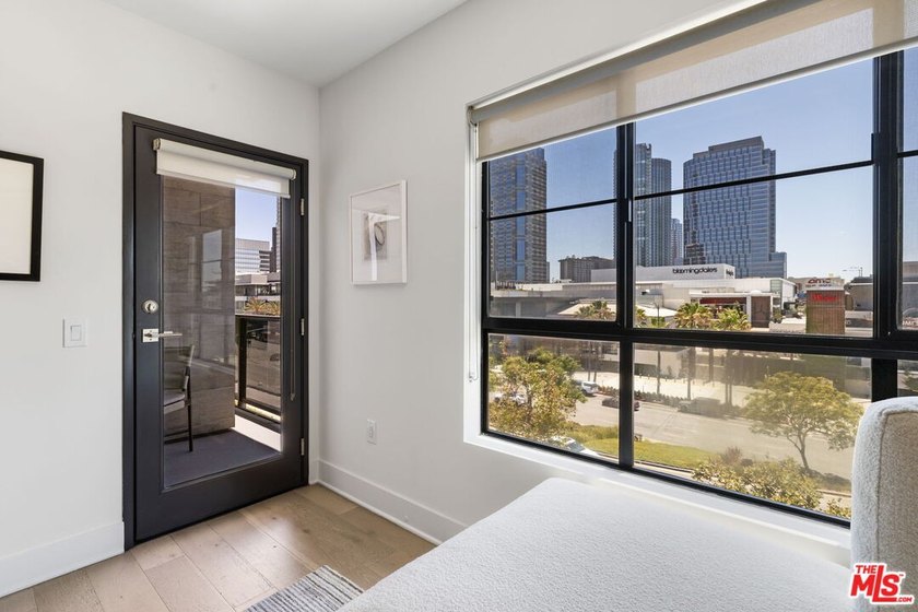 Stunning newer contemporary condo right across the street from - photo 10