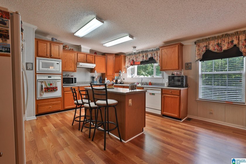 TUCKED away with privacy, this home sits on 3 acres with room to - photo 9