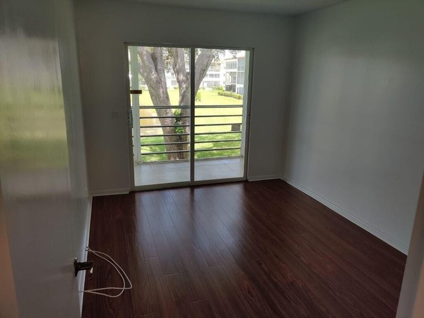 Welcome to this charming two-bedroom, one-and-a-half-bath - photo 8