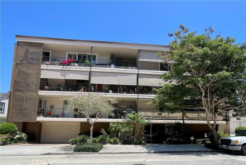 Welcome to this beautifully remodeled condominium in the highly - photo 2