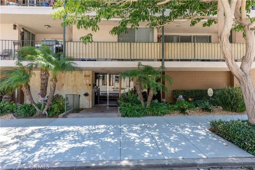 Welcome to this beautifully remodeled condominium in the highly - photo 3